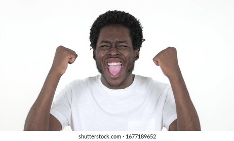 Casual African Man Celebrating Success Isolated On White Background