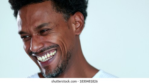 Casual African Man Smiling And Laughing, Real Life Authentic Person Smile Portrait.