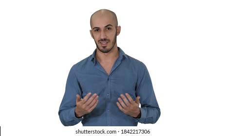 Casual Arab Man Talking To Camera Explaining Something On White Background.