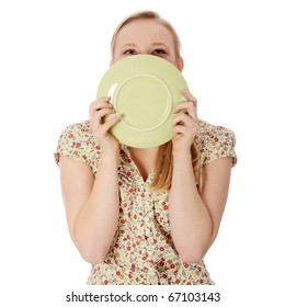 Casual Blond Woman Licking Plate