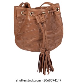 Casual Brown Shoulder Bag For Ladies. Soft Leather Handbag Or Purse With Long Adjustable Shoulder Strap, Drawstring Closure, And Tassel. Closeup.