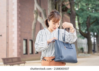 Casual Business Office Worker Looking Inside Bag