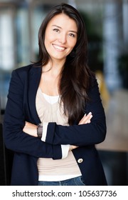 Casual Business Woman With Arms Crossed And Smiling