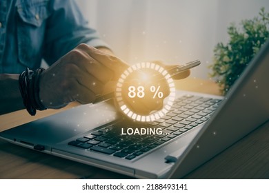 Casual Businessman Touching Mobile Phone or Smart Phone and Circle Loading Module and Laptop Computer. Searching or Downloading Concept in Vintage Tone