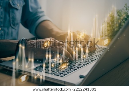 Casual Businessman Using or Typing Laptop and Slant Online Product Icon, Stock Market Bar Chart and Line Graph Trend. Consumer Discretionary Sector and Financial Economy Concept in Vintage Tone