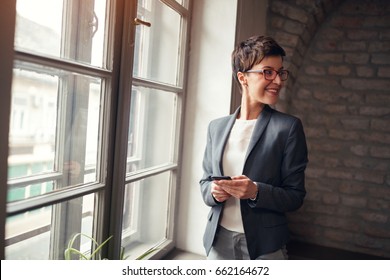 Casual business-smiling leader woman - Shutterstock ID 662164672