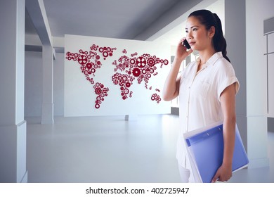 Casual businesswoman on the phone holding folder against white room with screen - Powered by Shutterstock