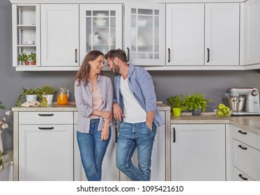 Casual Couple In The Kitchen