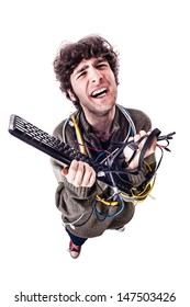 A Casual Guy With Tangled Cables And A Keyboard Struggeling To Get Computer Assistance. Isolated On White