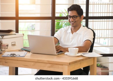 Casual Indian Male Working At Office