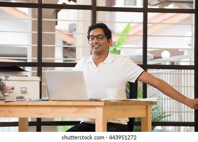 Casual Indian Man Streching At Office