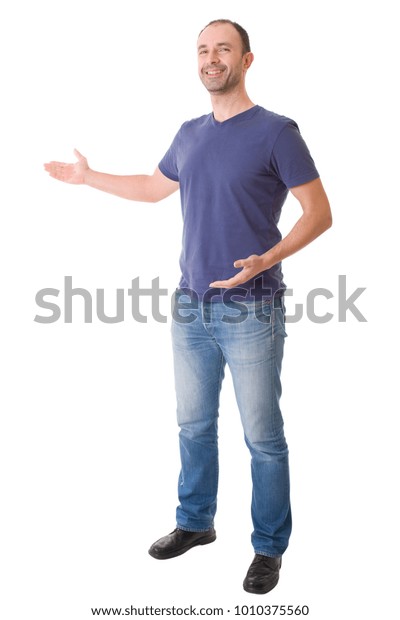 Casual Man Arm Out Showing Gesture Stock Photo Edit Now