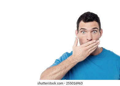 Casual Man Covering His Mouth With Hand Over White