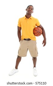 Casual Man Dressed In Yellow Pullover Shirt And Khaki Shorts Holding Basketball.  Shot In Studio Over White.