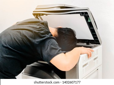 Casual Man Using The Copy Machine,copy His Face.