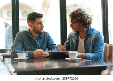 Casual Meeting In A Coffee Shop