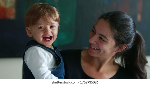 
Casual Mother And Baby Together Smiling, Real Life One Year Old Smiling To With Mom