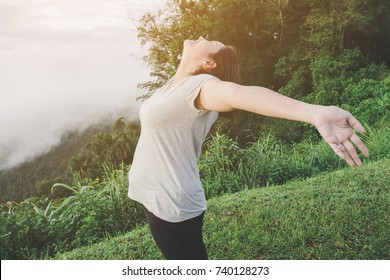 Casual Smart. Plump Girl Or Fat Woman Happy While Gesture Open Arms And Enjoying Fresh Air Or Nature On Mountain Summit Enjoying Today Is A Good Start. Freedom ,peace And Success Concept