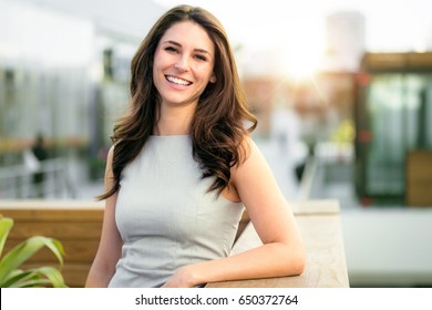 Casual smiling laughing lifestyle of single female, natural look healthy skin and perfect teeth