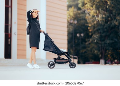 
Casual Trendy Mom Walking Her Infant In A Stroller. Busy New Mother Pushing A Baby Carriage Outdoors Running Errands Together
