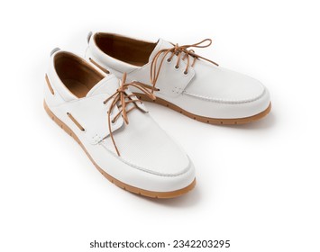 Casual white summer leather lace-up shoes. New men's soft loafers on a white background.