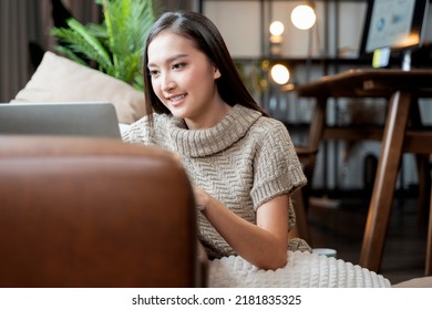 Casual Working At Home Relax Casual Using Tablet Device In Living Room,asian Female Adult Hand Typing Search Or Texting Via Laptop Sofa Working From Home With Happiness Peaceful Smiling Ideas Concept