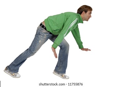 Casual Young Man Crouching On White Background