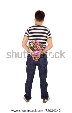 Similar – Man in jeans and plaid shirt with some white flowers in his hand