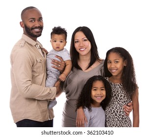 casual young mixed family on white isolated background