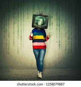 Casual young woman showing thumbs up like feedback gesture and old tv instead of head. Television manipulation and brainwashing concept. Mass media propaganda control. Matrix symbols falling down.