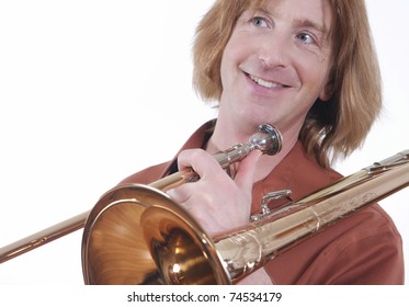 A Casually Dressed Trombone Player With The Trombone On His Shoulder, Isolated On White.