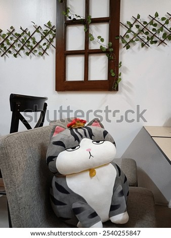 Similar – Mother hugging her baby in front of fireplace