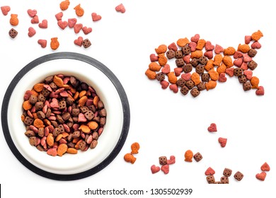 Cat Food. Dry Food In Shape Of Fish, Bowl With Food On White Backgorund Top View