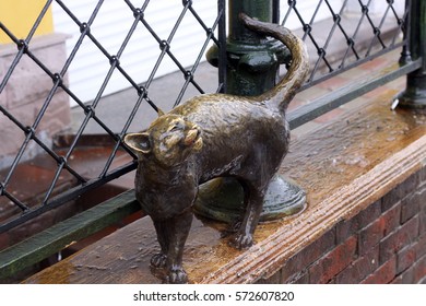 cat sculpture on the porch in Yaroslavl
