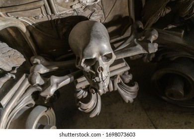 Catacombs in Paris, France. Graveyard with body parts and spooky and scary bones.