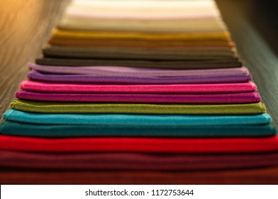 Catalog of multicolored cloth from matting fabric texture background, silk fabric texture, textile industry background with blurred, Colored cotton fabric,Macro, tissue catalog