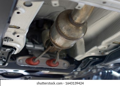 Catalytic converter of a modern car bottom view. - Shutterstock ID 1643139424