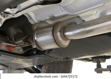 Catalytic converter of a modern car bottom view.	 - Shutterstock ID 1696725172