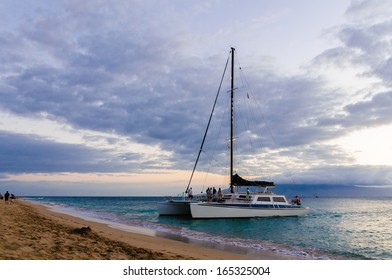 Catamaran Cruise Boat At Sunset On Maui, Hawaii, USA