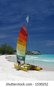 A Catamaran On The Beach In Barbados