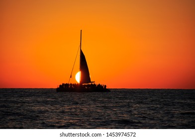 Catamaran On A Open Water Sunset Cruise