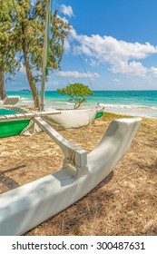 A Catamaran Sitting At The Shore Of Waimanalo Bay On Oahu, Hawaii