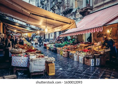 Catania, Italy - December 17, 2016: Food Stalls On La Pescheria Historic Fish Market Behind The Cathedal Square In Catania, Siicily