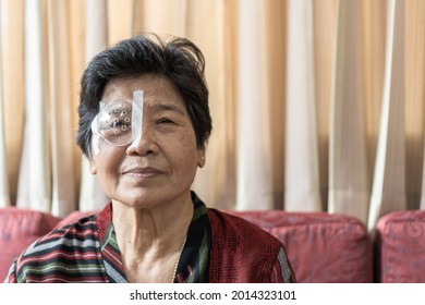 Cataract Elderly Patient, Asian Old Senior Woman Having Eye Care Treatment On Age-related Eye Diseases, AMD, Diabetic Retinopathy, Retinal Disorders Problem, Retinal Detachment, Glaucoma Or Low Vision