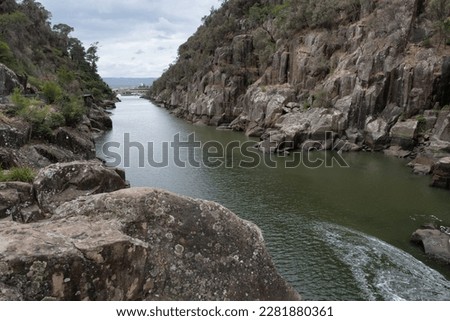 Cataract Gorge, in the lower part of the South Esk River in Launceston, Tasmania, with the Cataract Gorge Bridge at the very back. The cataract is the main tourist attraction of the region