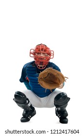 Catcher Squatting Behind Home Plate. Young Man Wearing Gear And Uniform. Baseball Player In Action, Isolated On White.