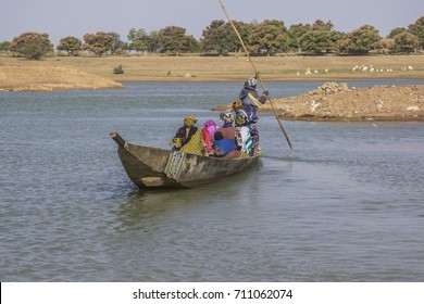 Catching A Pirogue Across The Bani River Going Home From The Monday Market At Djenne, Mali