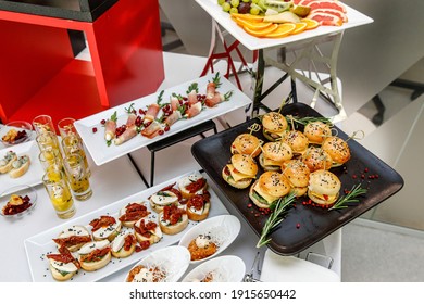 Catering Banquet Table With Different Food Snacks And Appetizers