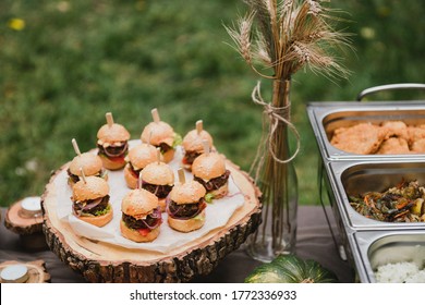 Catering Banquet Table At Reception. Casual Wedding Party. Food Styling, Appetizers Bar, Welcome Drink, Event Design.