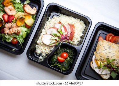 Catering Food With Healthy Balanced Diet Delicious Lunch Box Boxed Take Away Deliver Packed Ready  Meal In Black Container Dinner, Meal, Brakfast